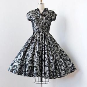 Gorgeous 1950s brocade with metallic feathers